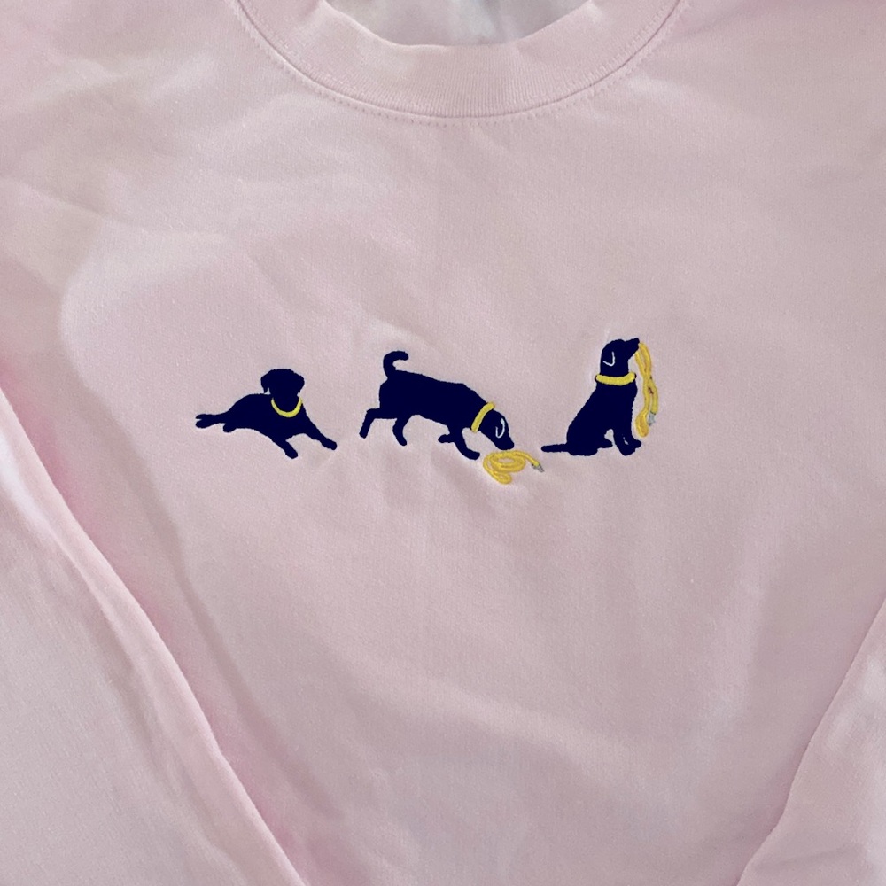 Black lab with yellow leash Embroidered Sweatshirt